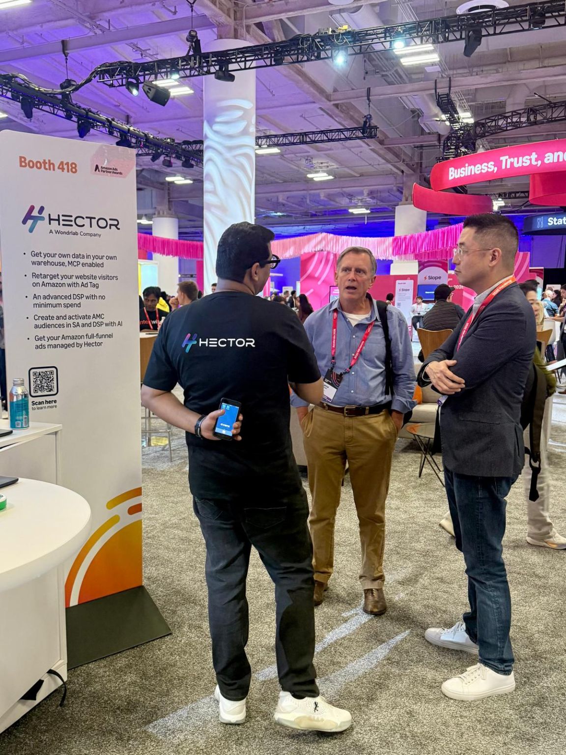 Hector Ai team meeting attendees at the Hector Ai booth at Amazon Accelerate 2026