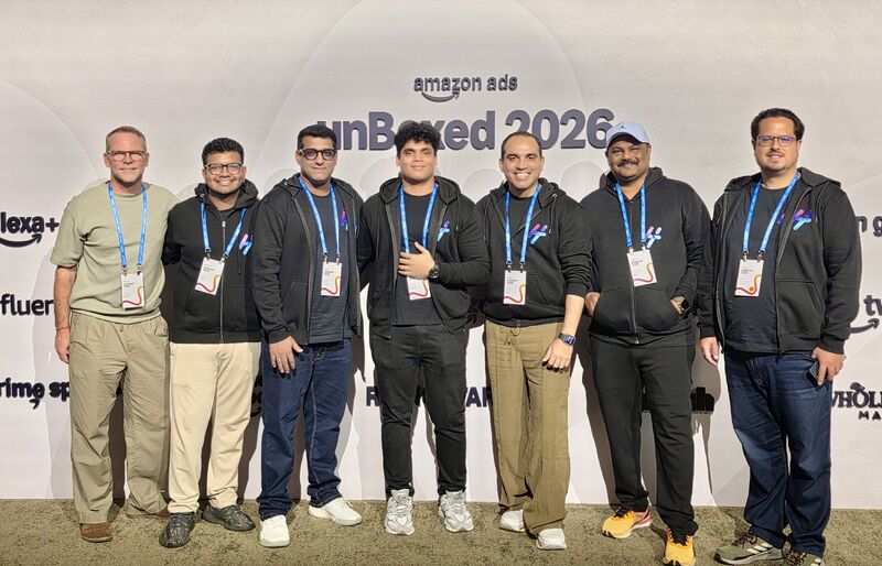 The Hector Ai team in front of the Amazon Ads unBoxed 2026 backdrop in San Francisco